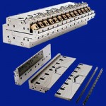 Wide width slot dies